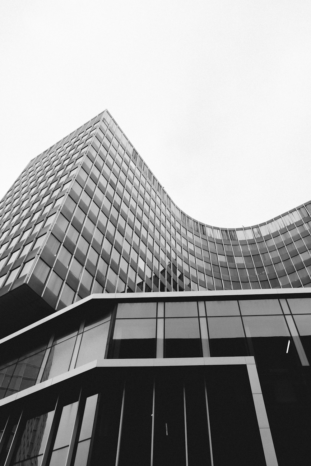 a black and white photo of a tall building