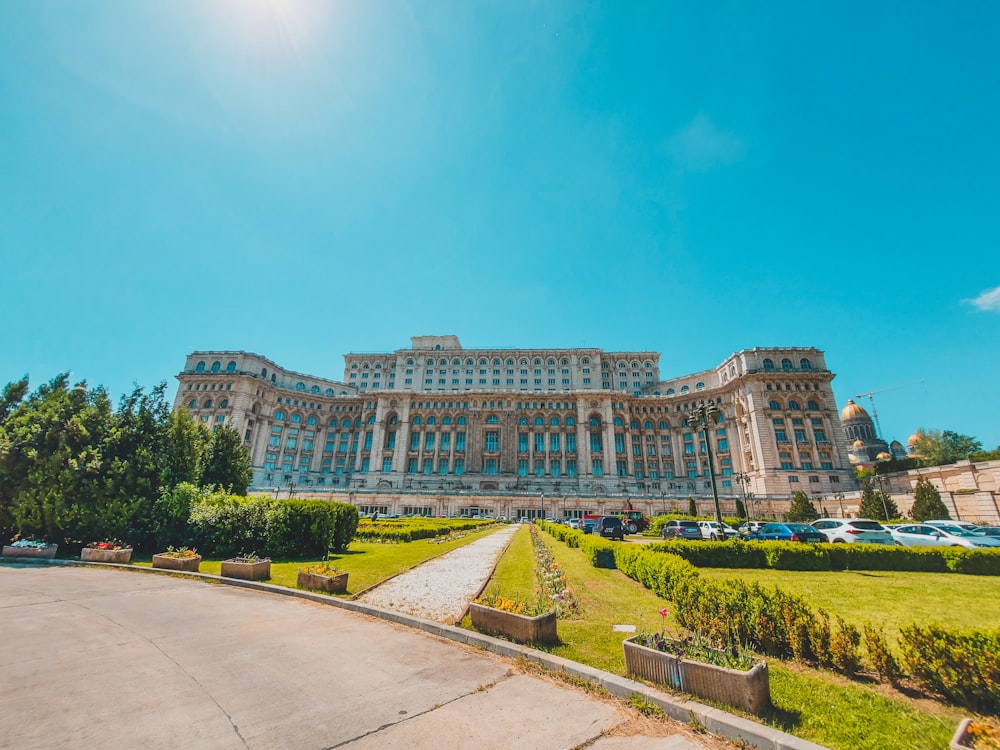 a large building sitting on the side of a road