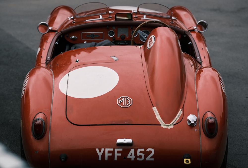 a close up of a red sports car