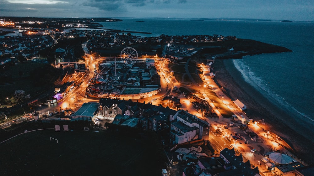 an aerial view of a city at night