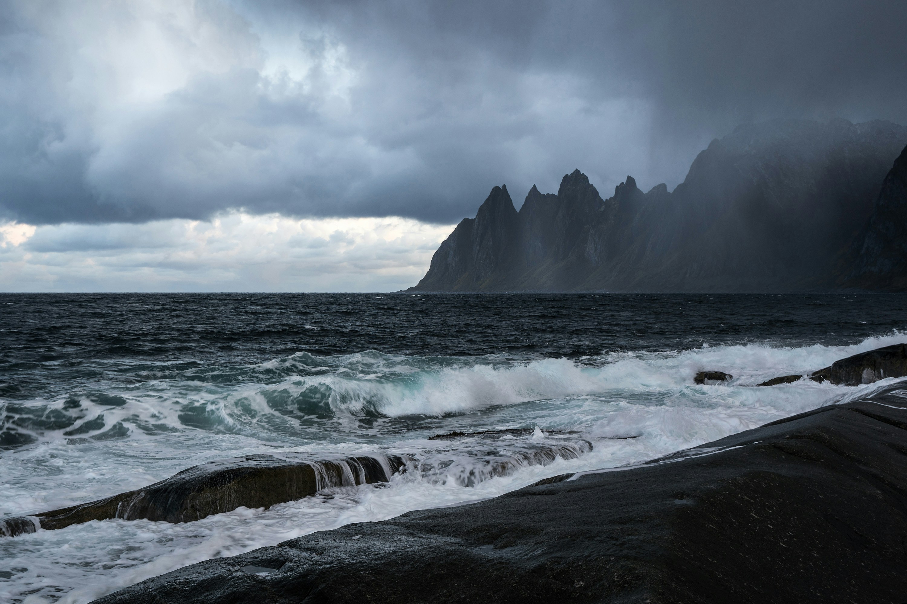 a large body of water surrounded by mountains