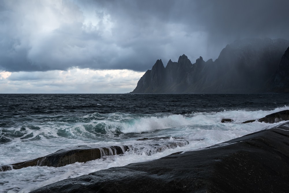 a large body of water surrounded by mountains