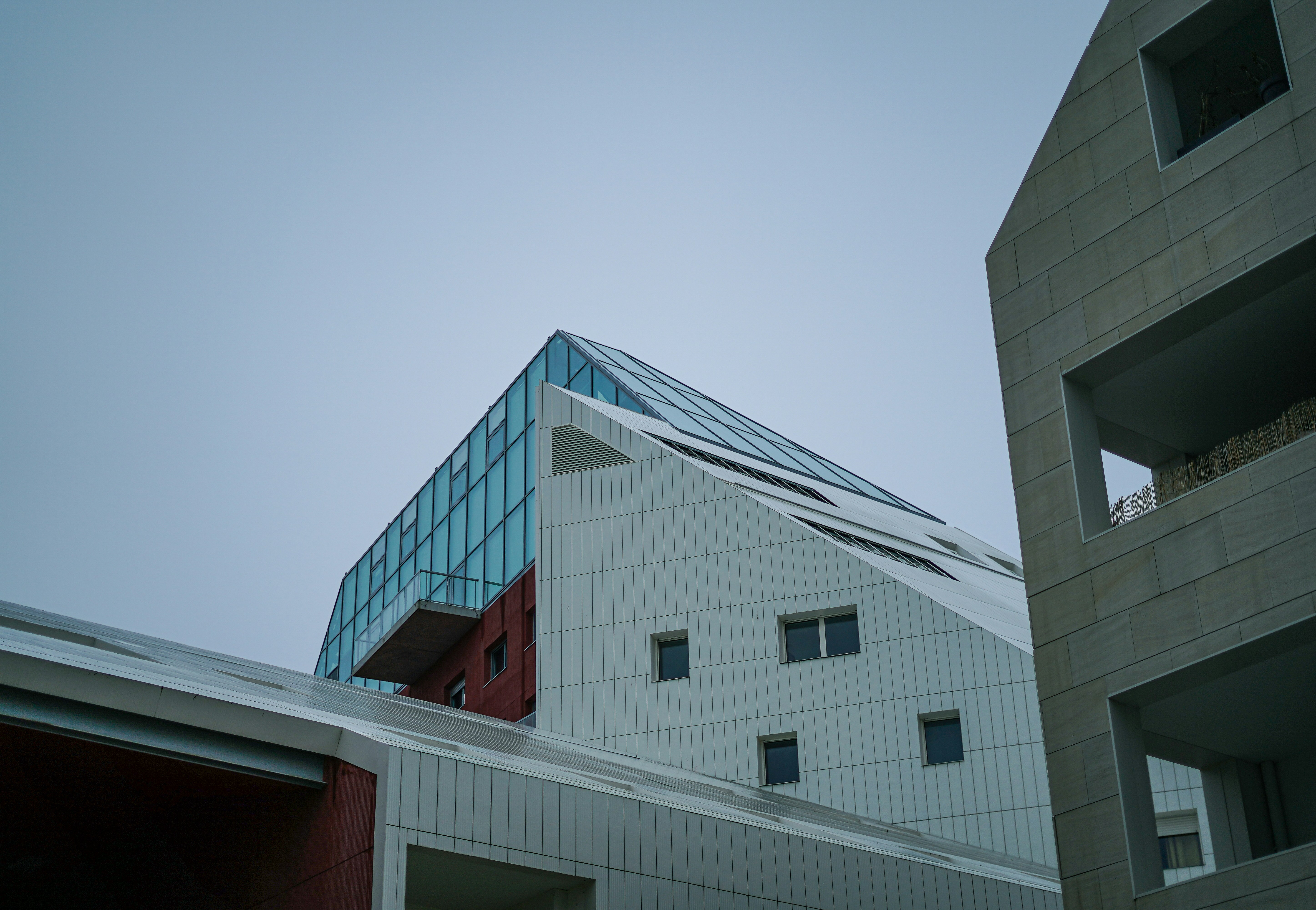 a tall building with a sky background