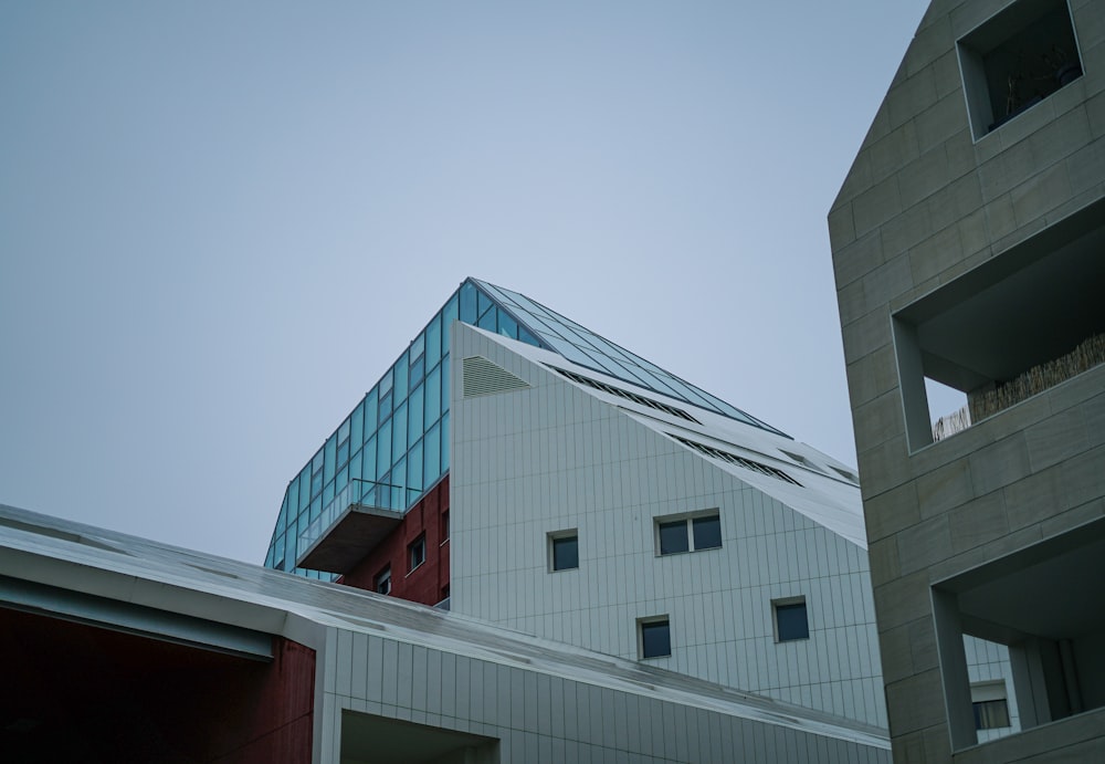 a tall building with a sky background