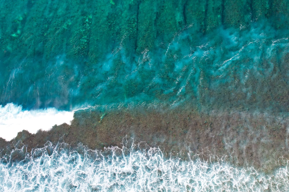 a bird's eye view of the ocean waves