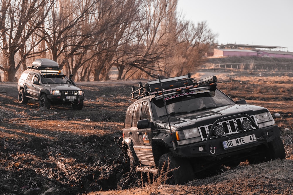 a couple of vehicles that are in the dirt