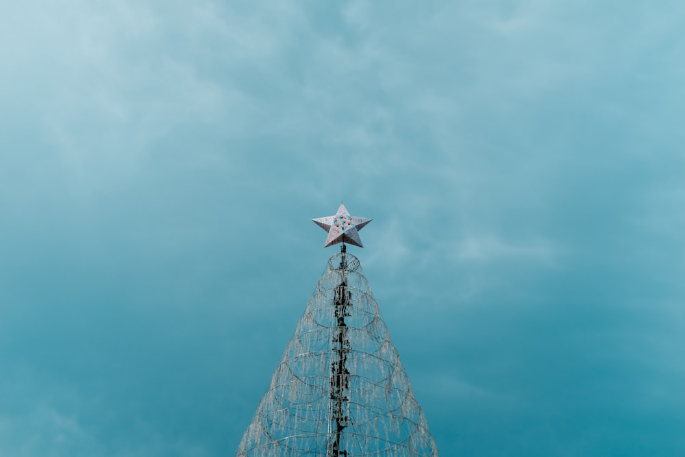 a star on top of a radio tower