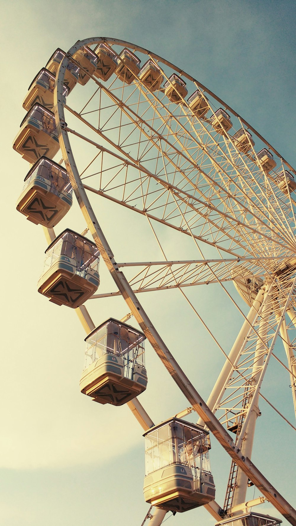 a ferris wheel with people sitting on it
