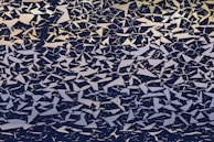 Metal fragments arranged like an artist’s palette, ready to be shaped anew.