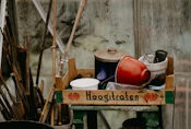 a wooden crate filled with pots and pans