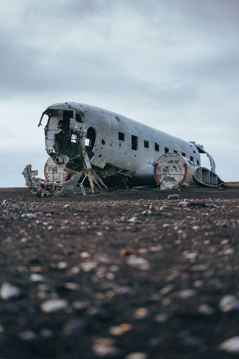 a plane that is sitting in the dirt