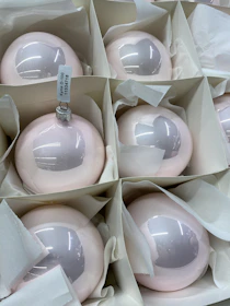 Close-up of silicone nameplates and ornaments arranged neatly.