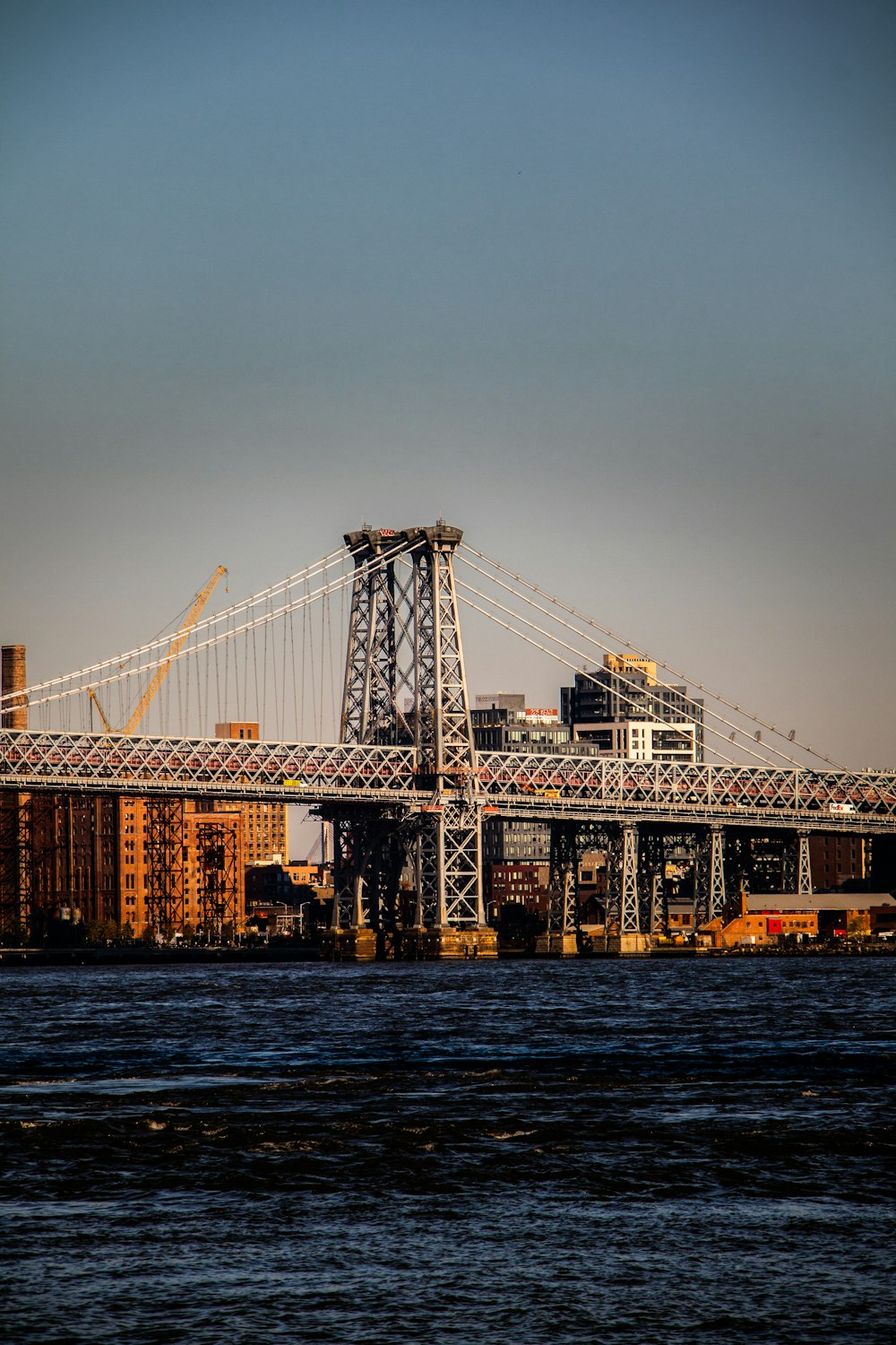 a large bridge spanning over a large body of water