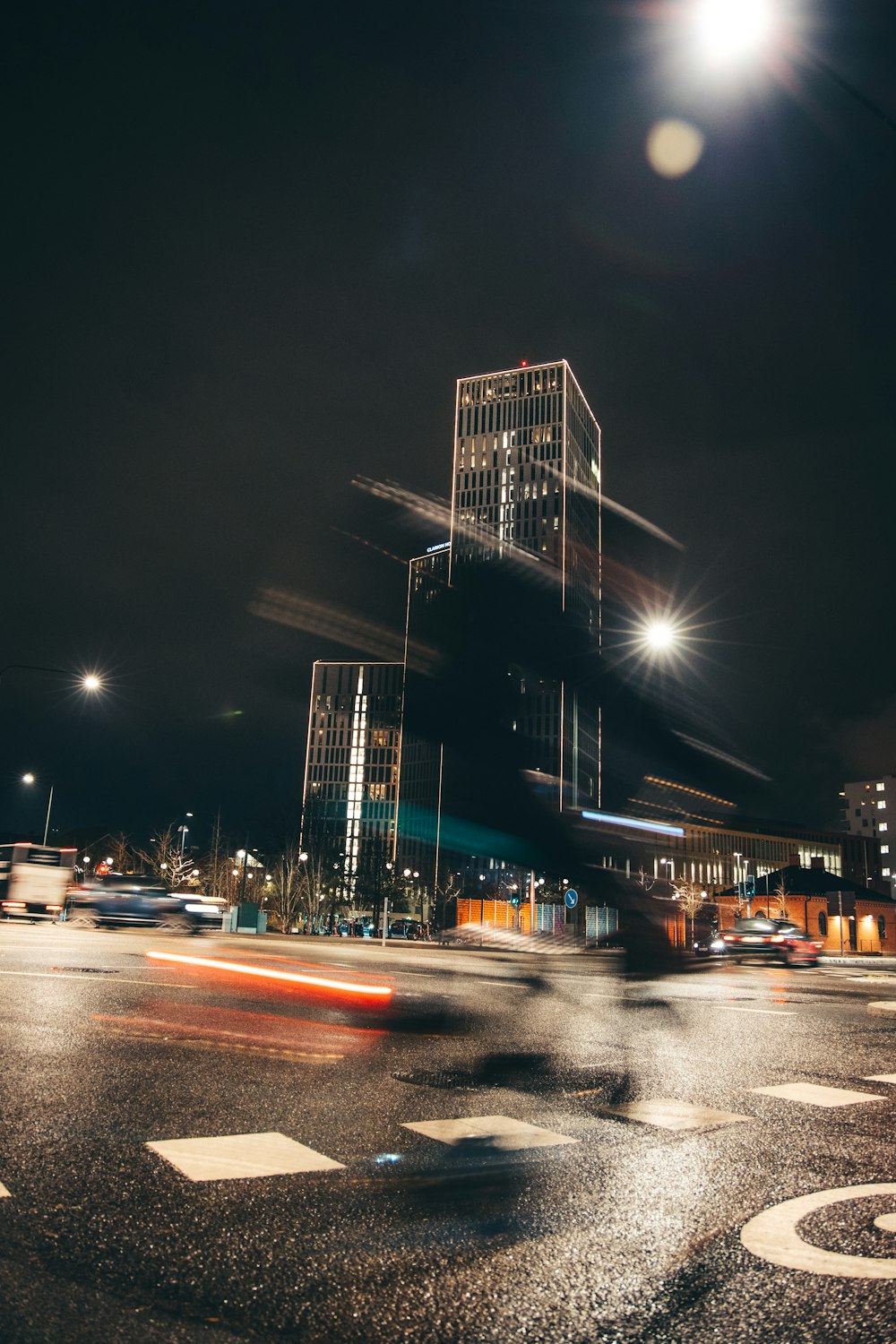 a blurry photo of a city street at night