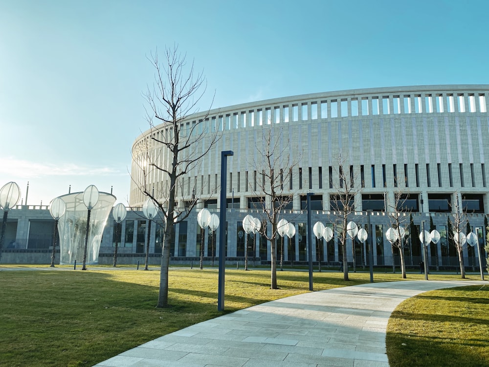 a large building with a walkway in front of it