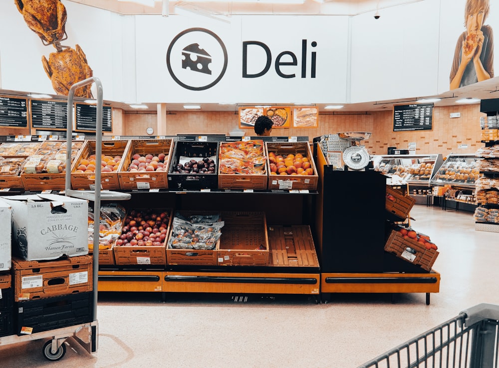 a deli filled with lots of fresh produce