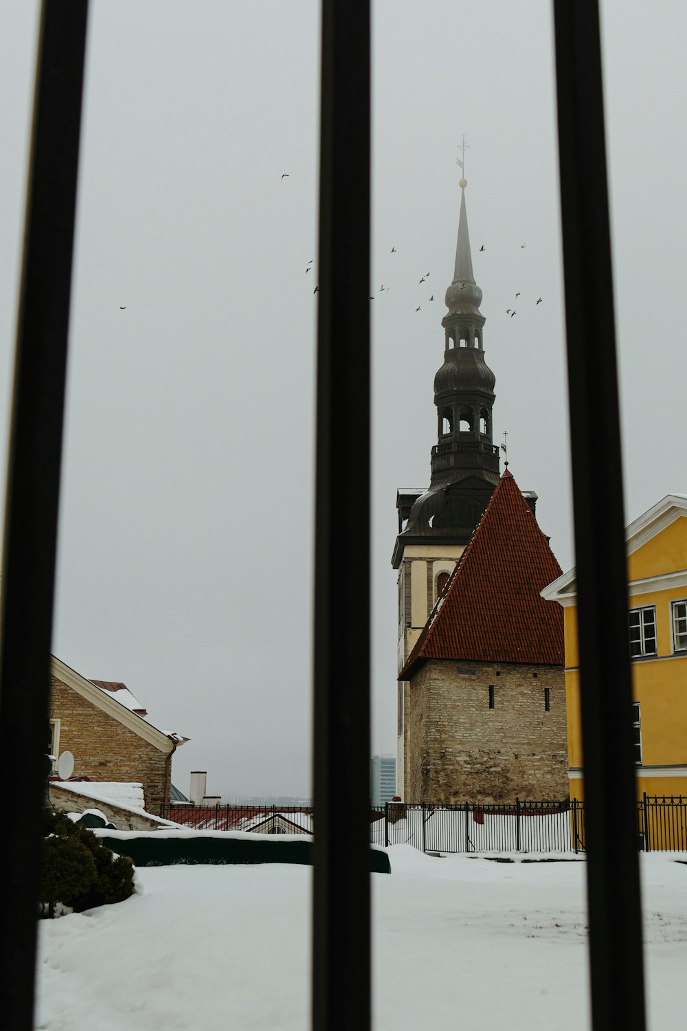 a view of a church through a window