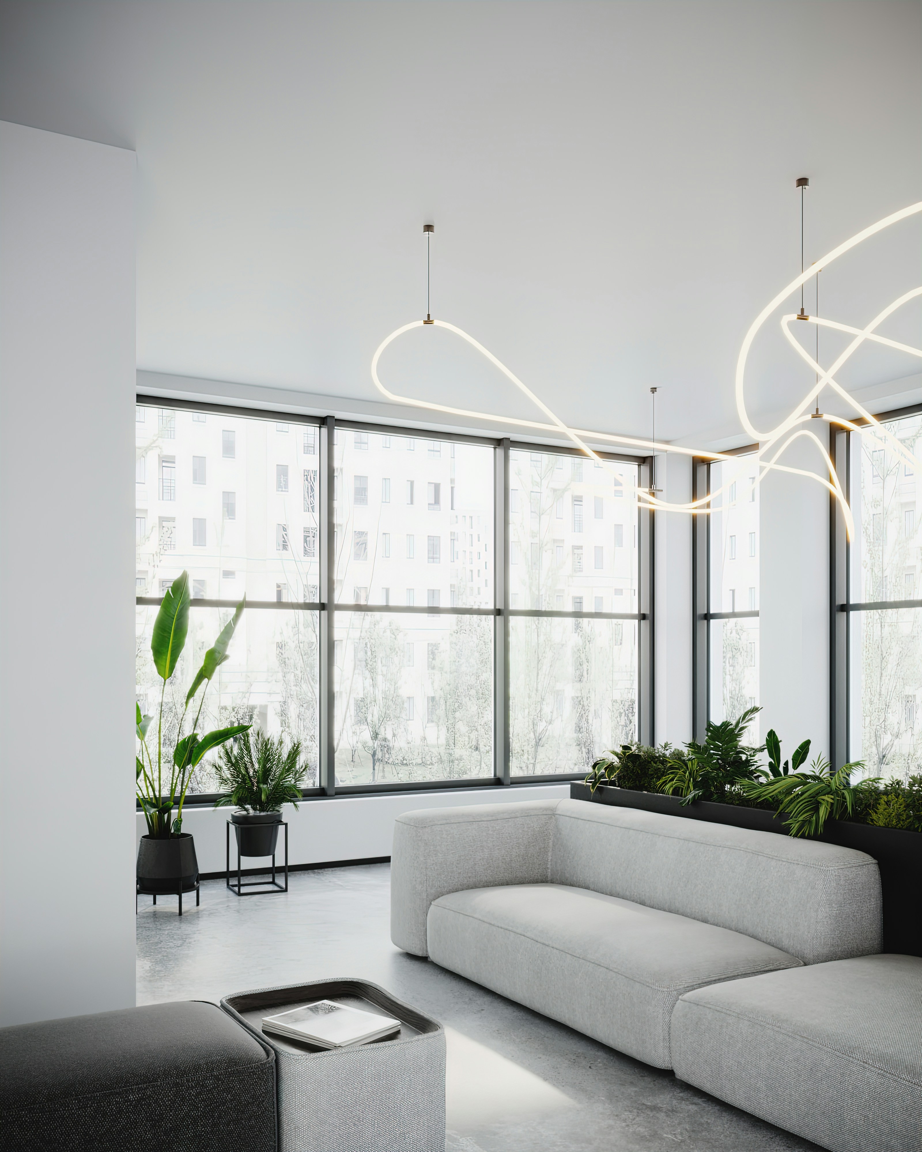 a living room with a couch and a planter