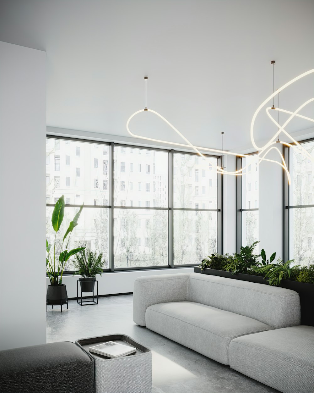 a living room with a couch and a planter