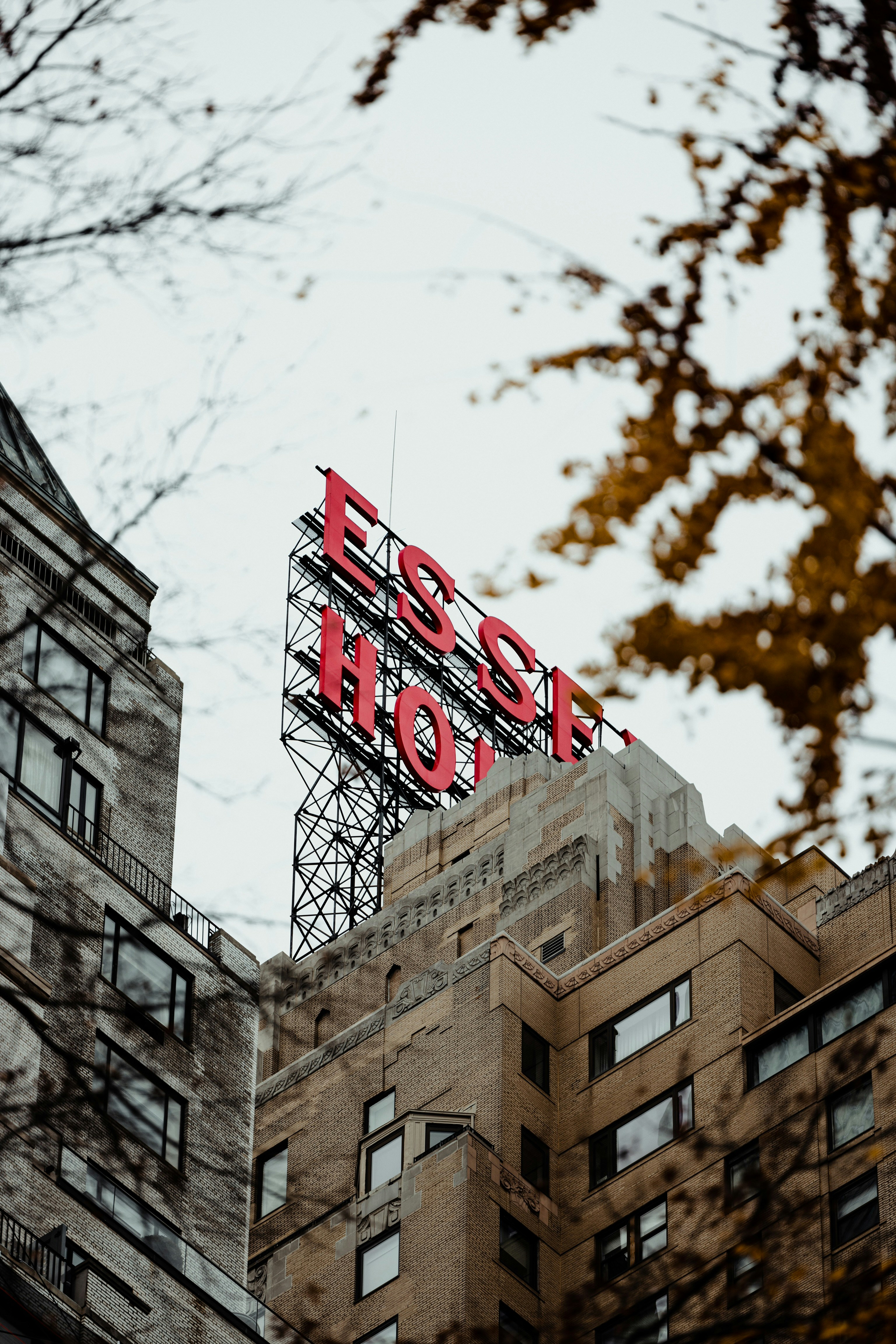 a large sign on top of a tall building