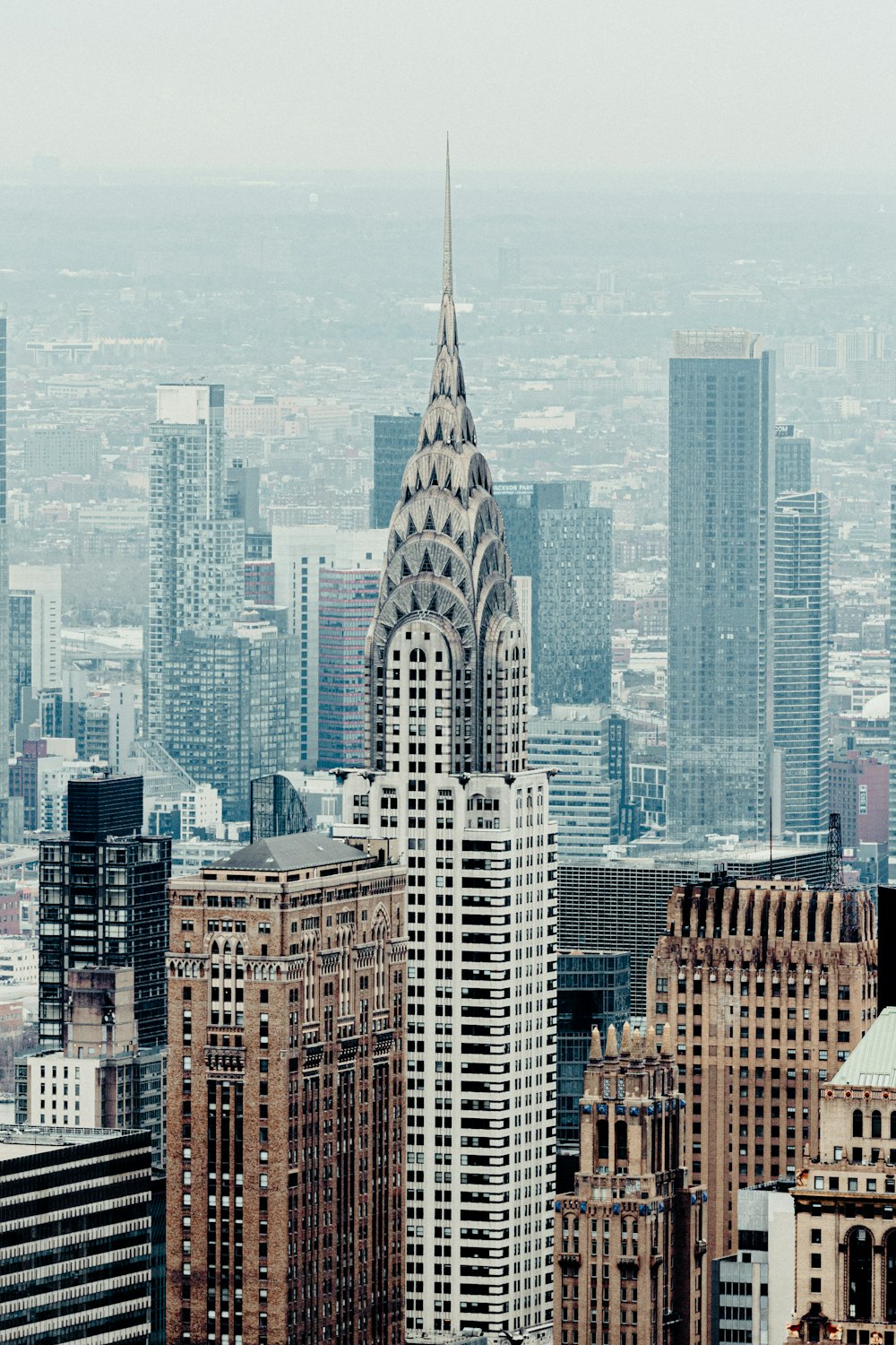 a view of a very tall building in a big city