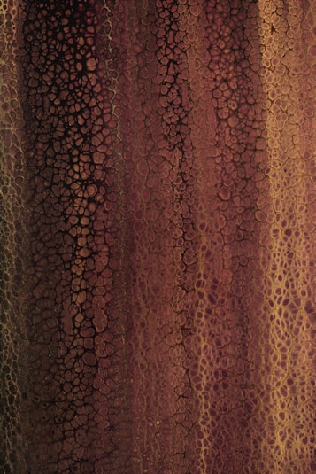 a close up of a wall with a pattern on it