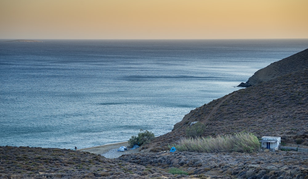 a view of a body of water from a hill