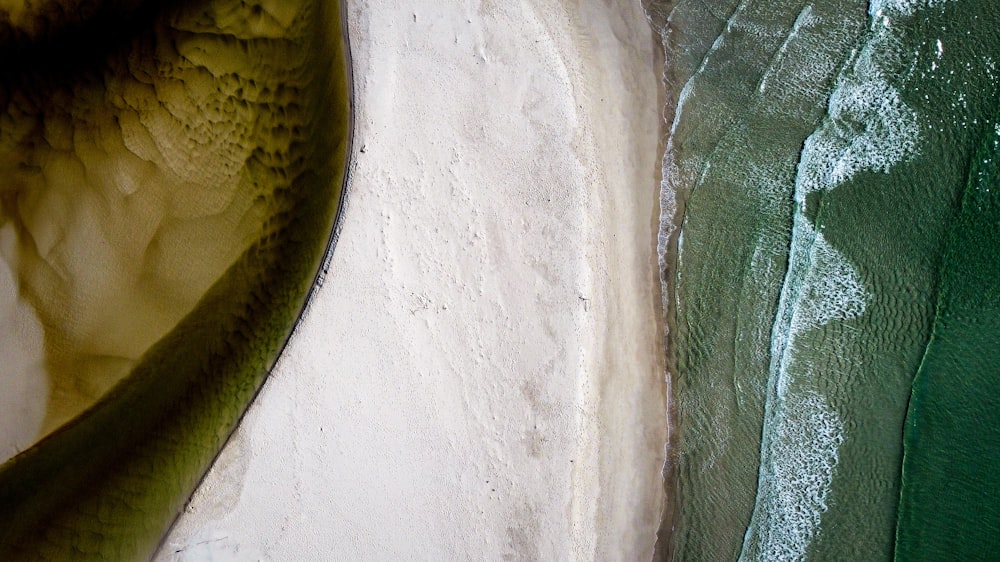 a close up of a green and white wall