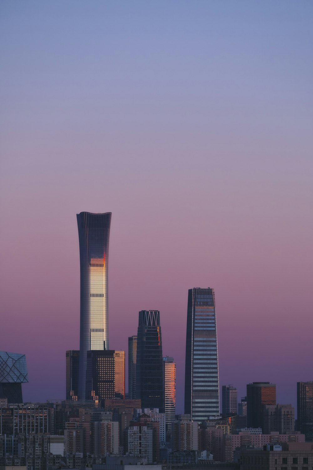 a view of a city with tall buildings