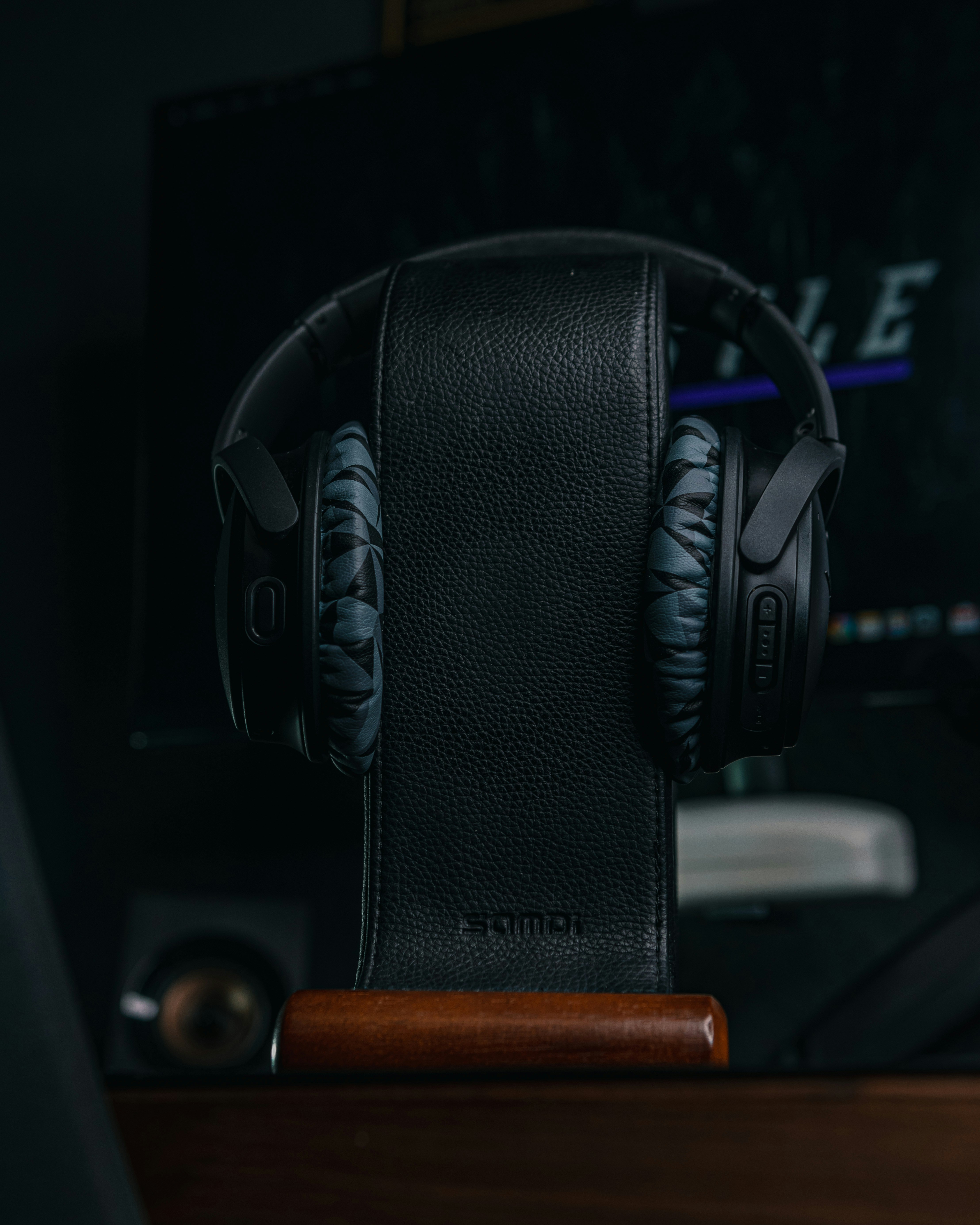a pair of headphones sitting on top of a desk