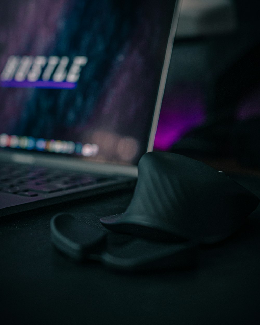 a laptop computer sitting on top of a desk