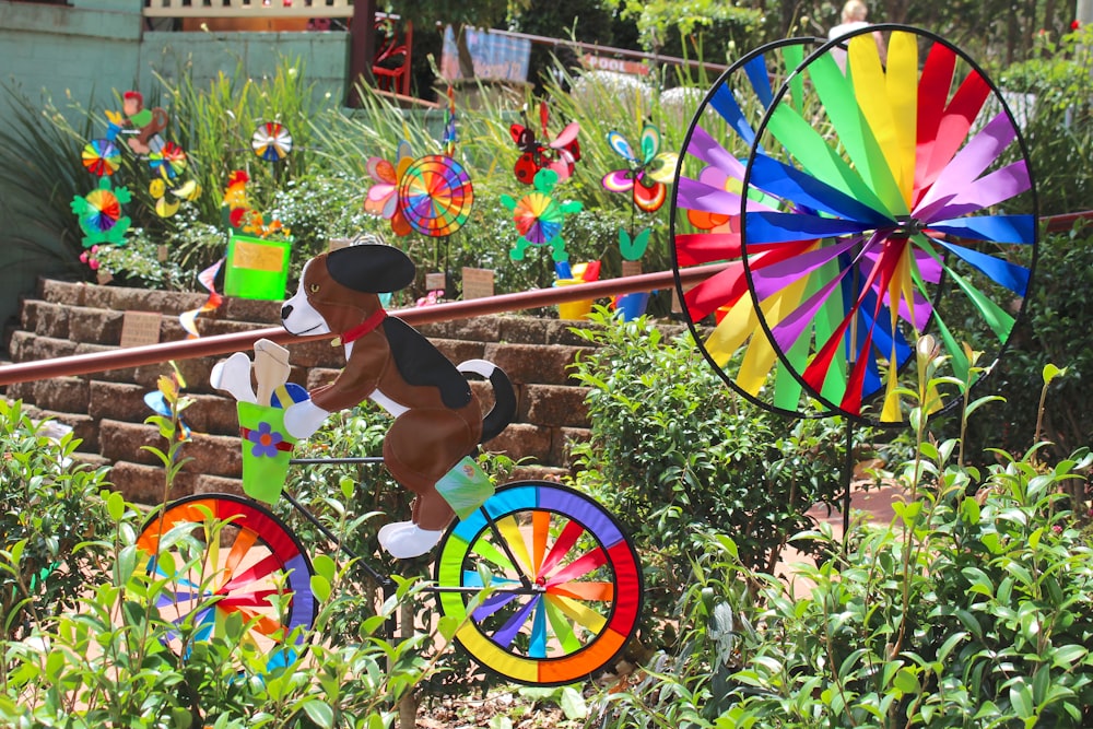 a person holding a colorful kite