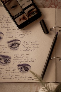 Sketchbook page filled with various anime eyes and expressions