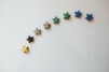 a row of stars sitting on top of a white table