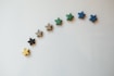 a row of stars sitting on top of a white table