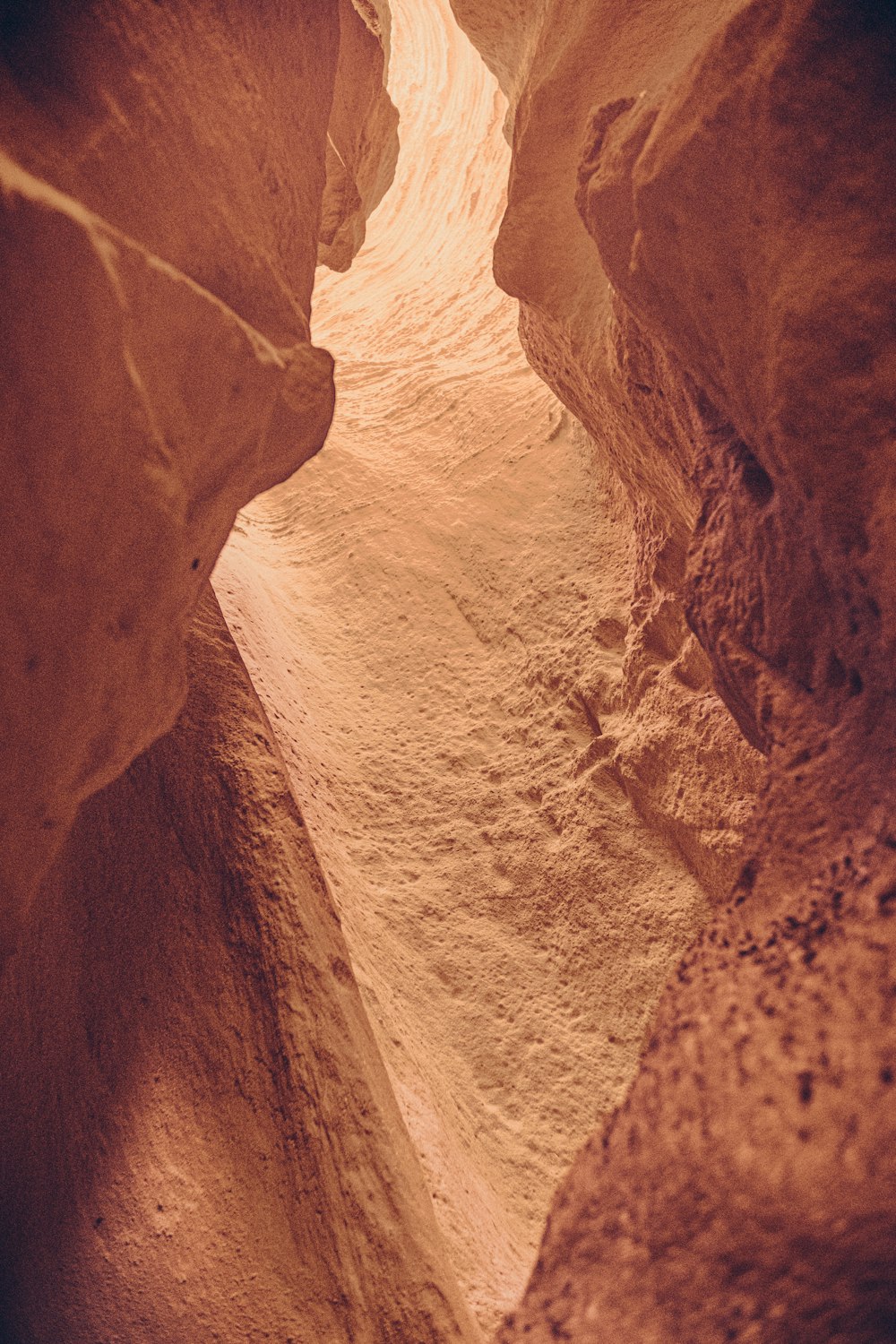 a narrow slot in the side of a mountain