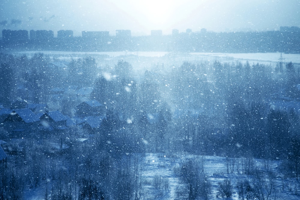 a view of a snowy city from a window