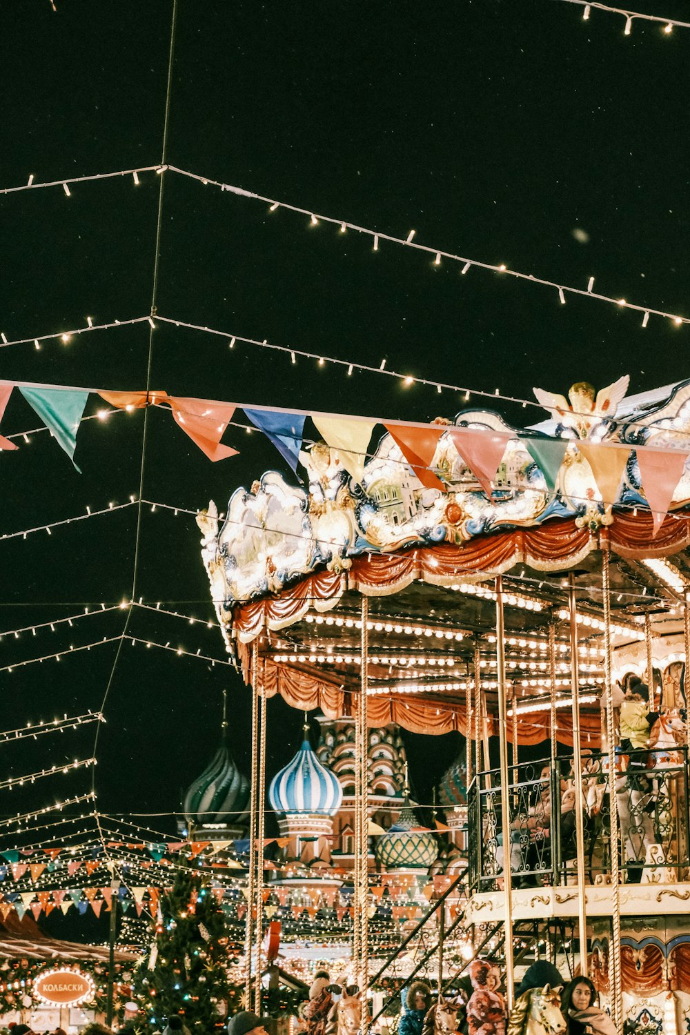 a merry go round at night with lights