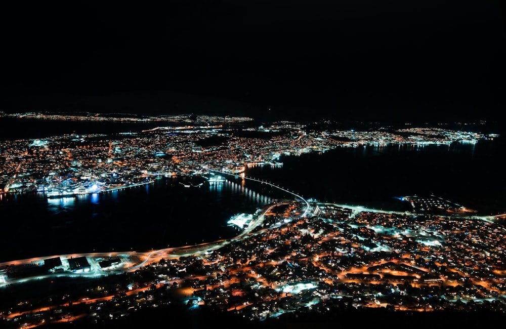 an aerial view of a city at night