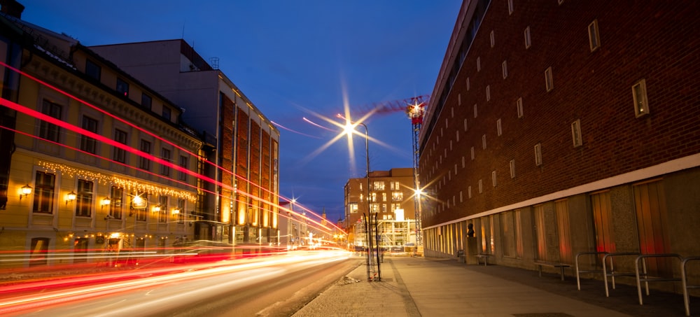 a city street at night with long exposure