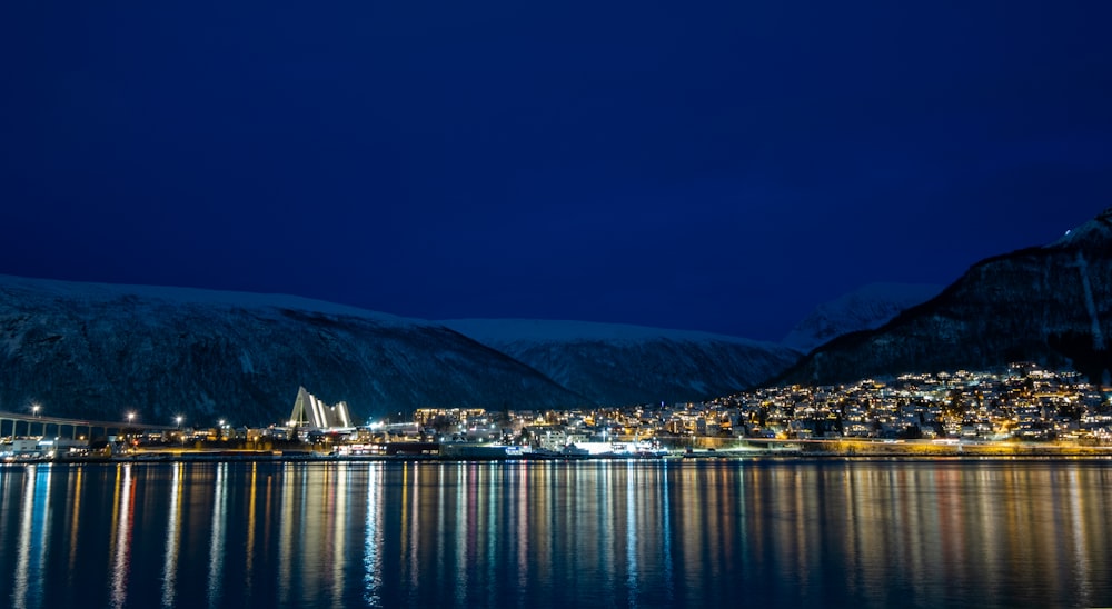 a view of a city at night from across the water