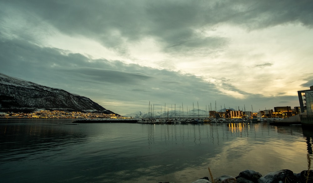 a body of water with a bunch of boats in it