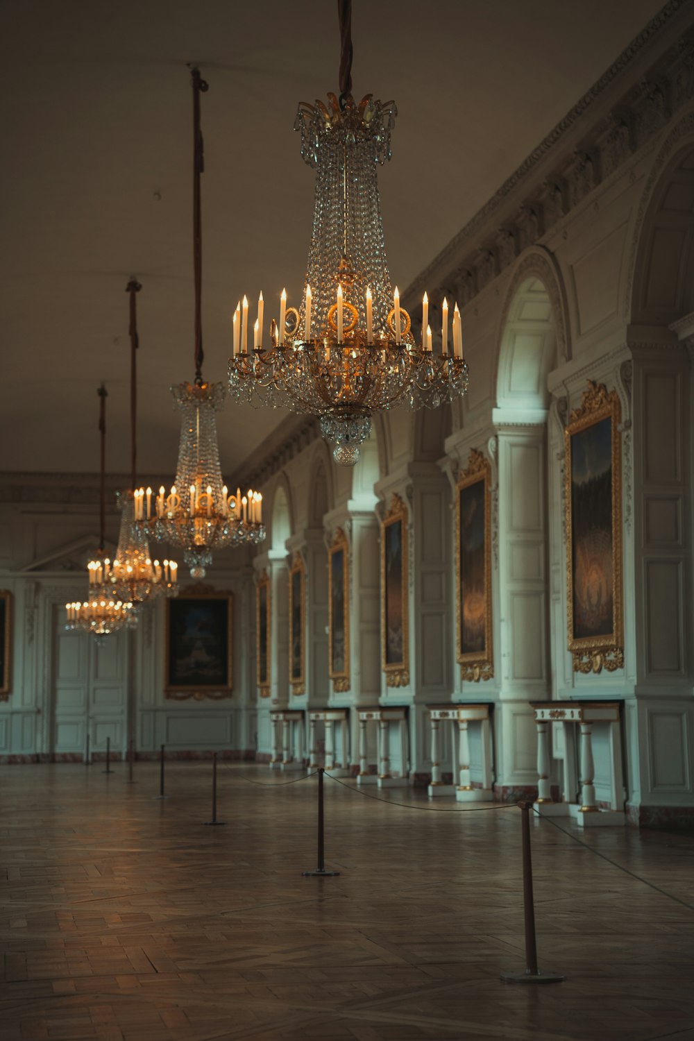 a chandelier hanging from a ceiling in a room