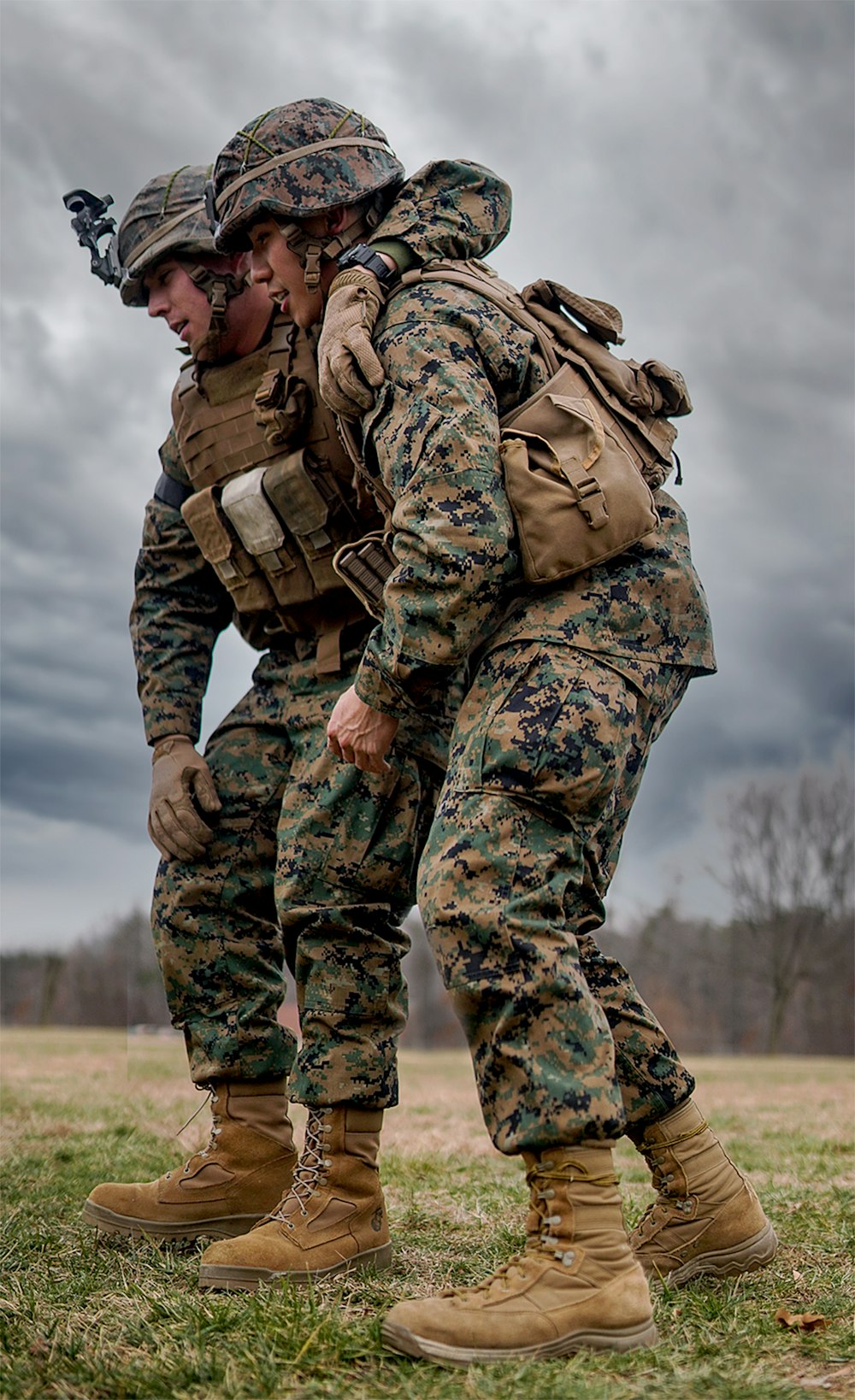 a couple of soldiers standing next to each other