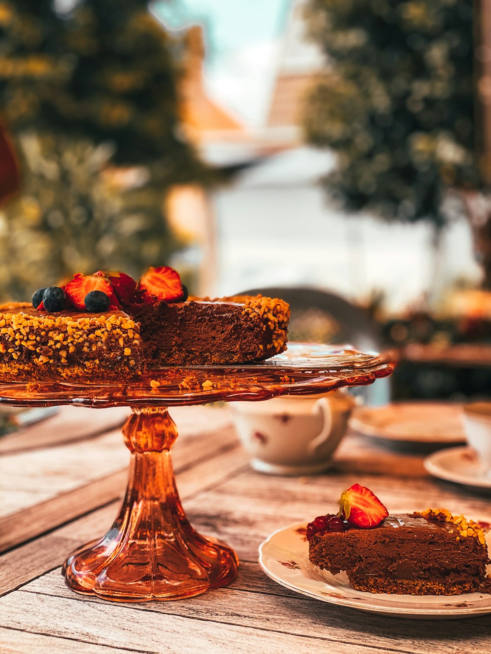 a piece of cake sitting on top of a wooden table