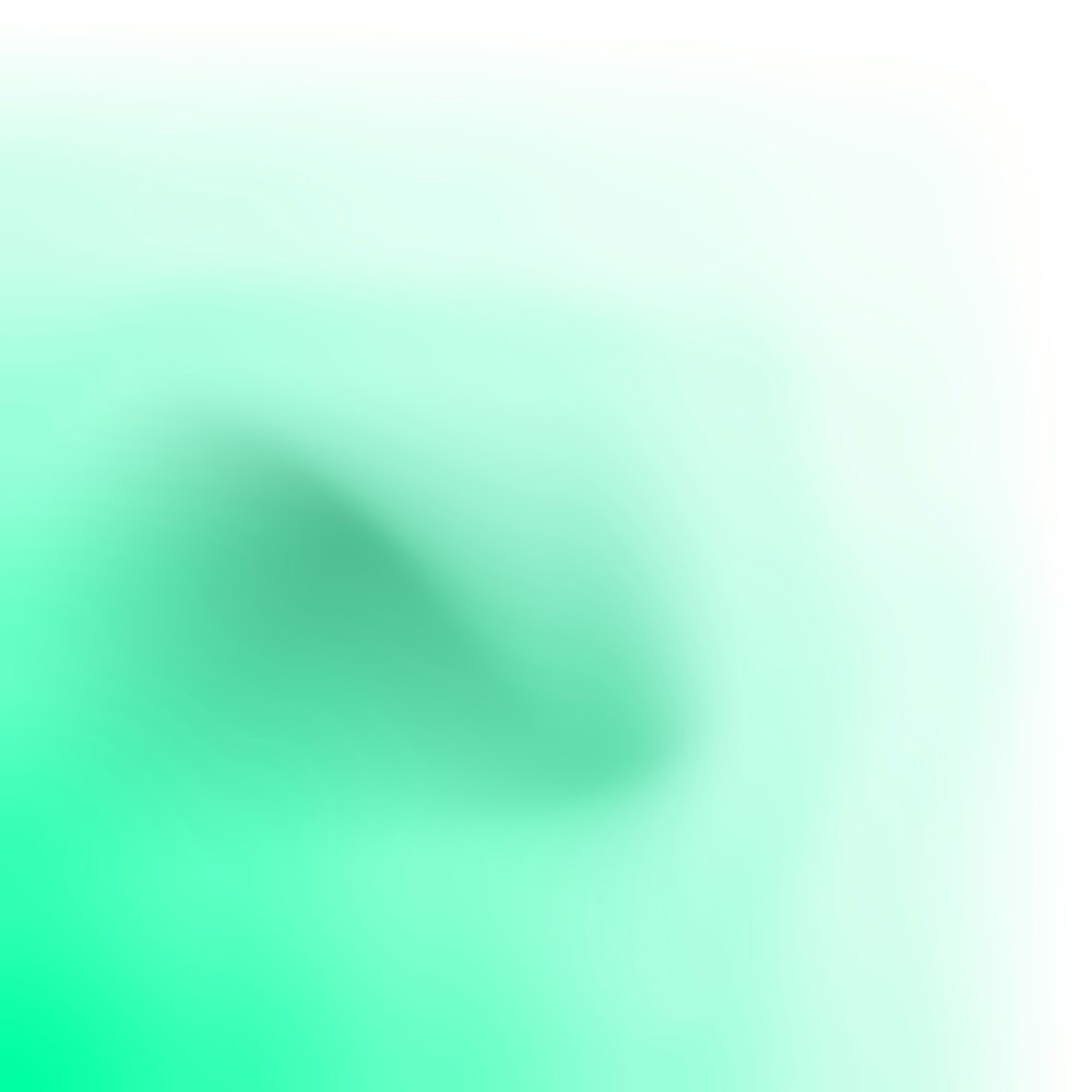 a blurry image of a green and white background