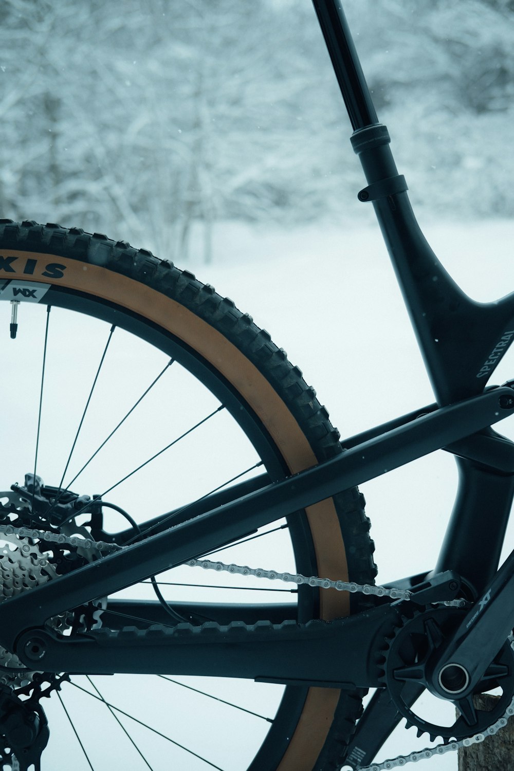 a mountain bike is parked in the snow