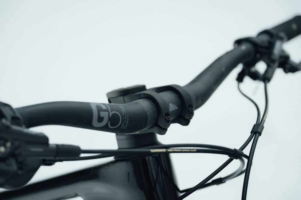 a close up of the handlebars of a bicycle