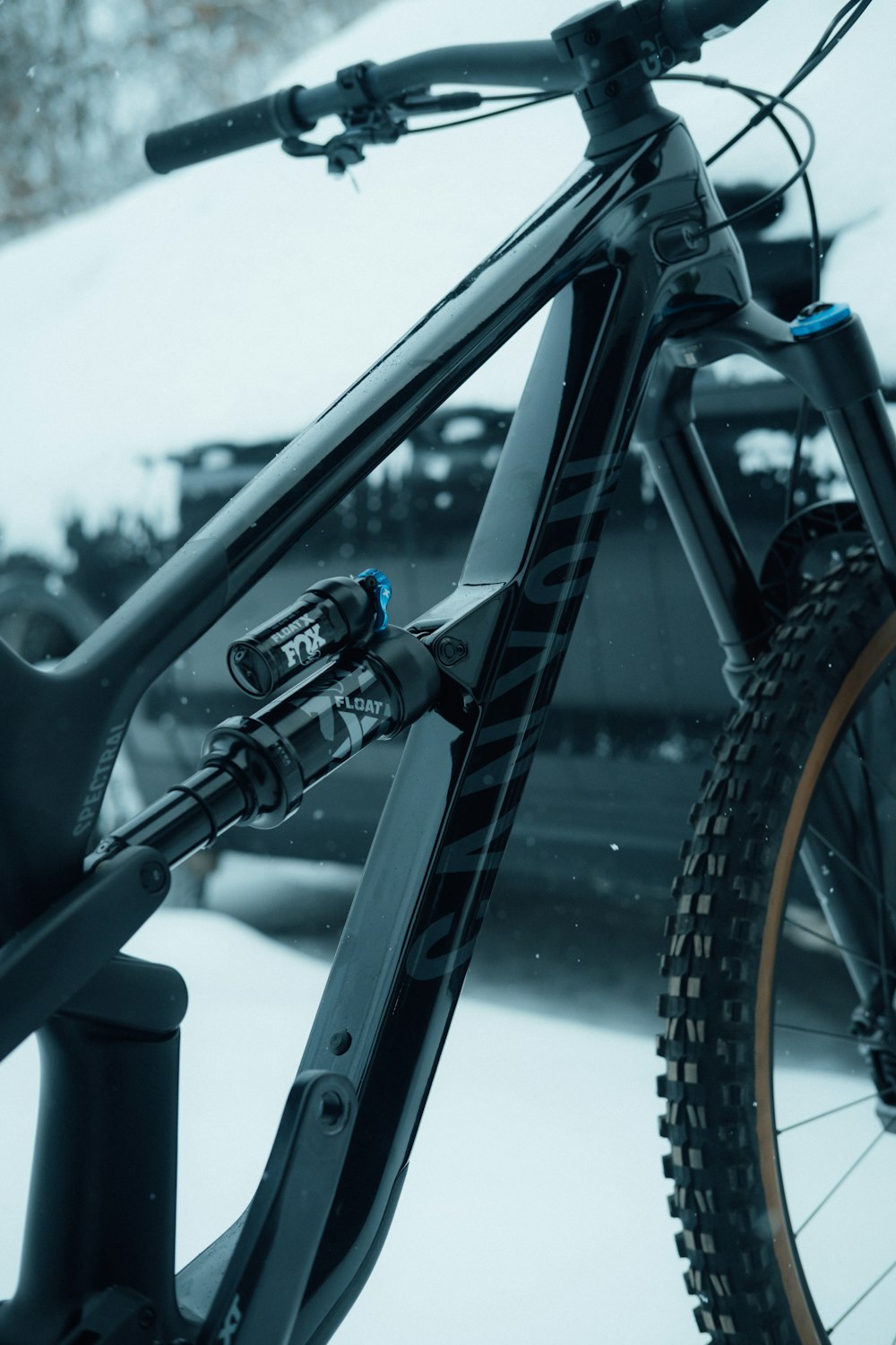 a mountain bike is parked in the snow