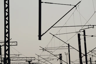 Elegant network lines connecting major cities on a dark map background.